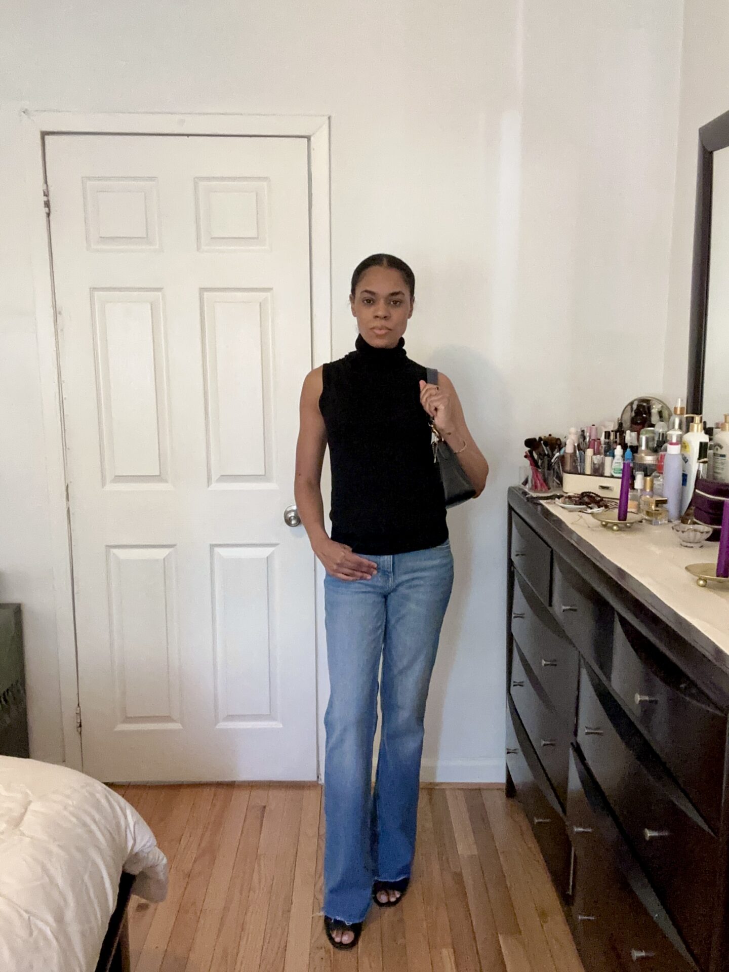 Very Venusian wearing a sleeveless turtleneck knit from Mango 2